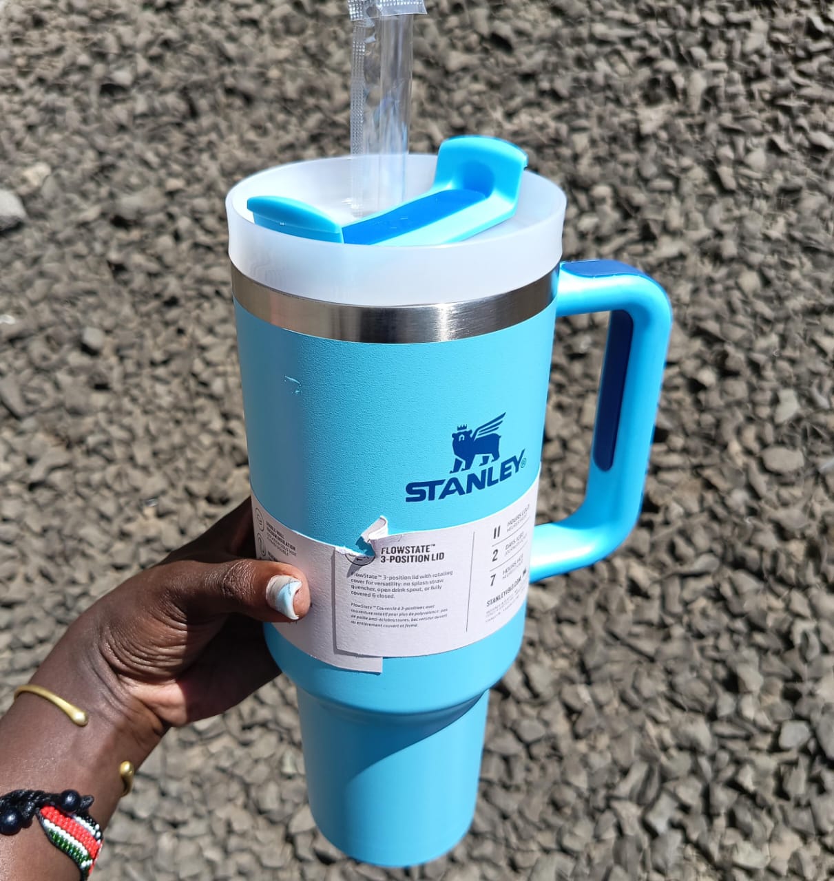 Blue Stanley mug  handheld 