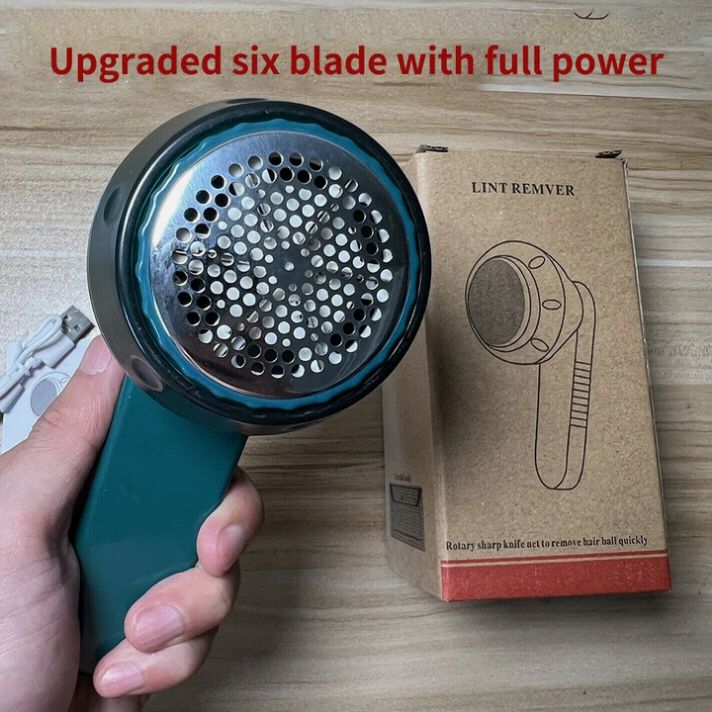 Handheld lint Remover with a cardboard box labeled 'lint remover