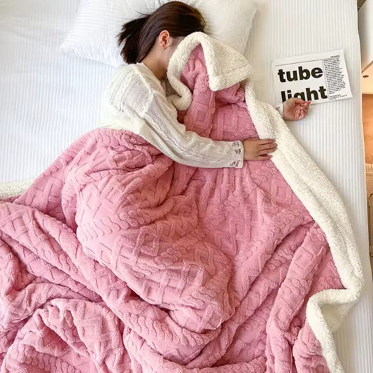 Person wrapped in a pink blanket 