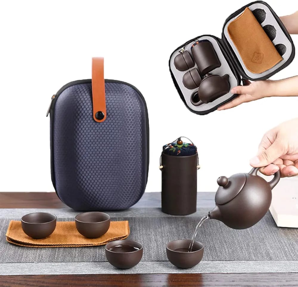 Tea set with carrying set on a white surface