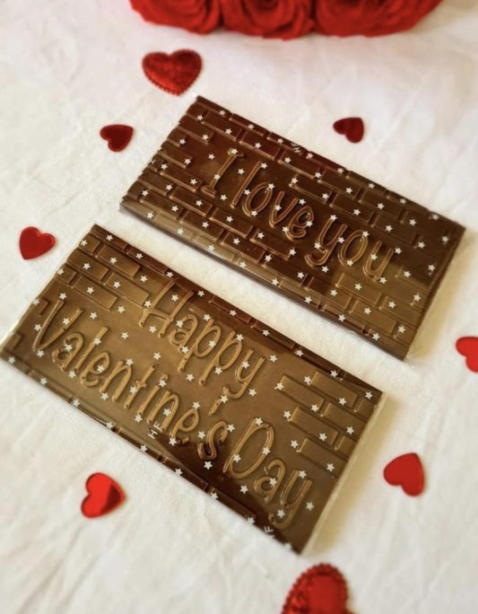 Two chocolate bars with 'i love you' and 'Happy Valentines Day' text