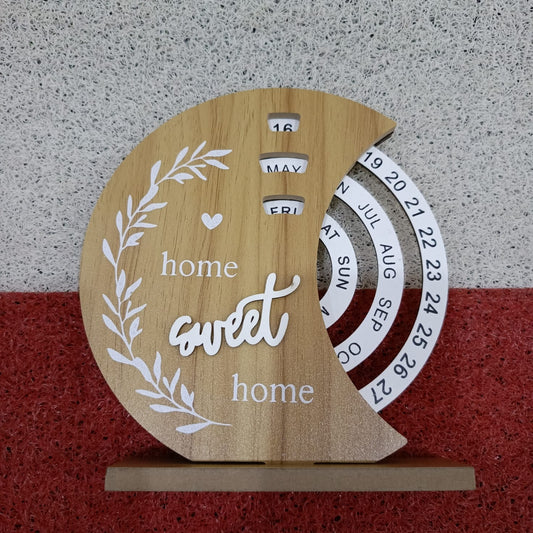 Wooden calendar with 'home sweet home'